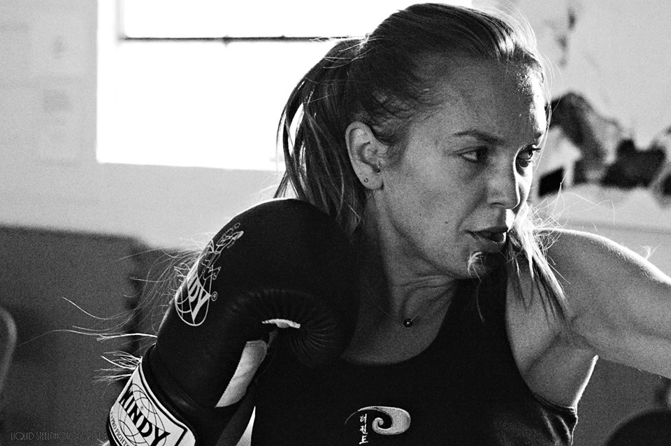 Daniela in sparring stance — focused intensity and discipline